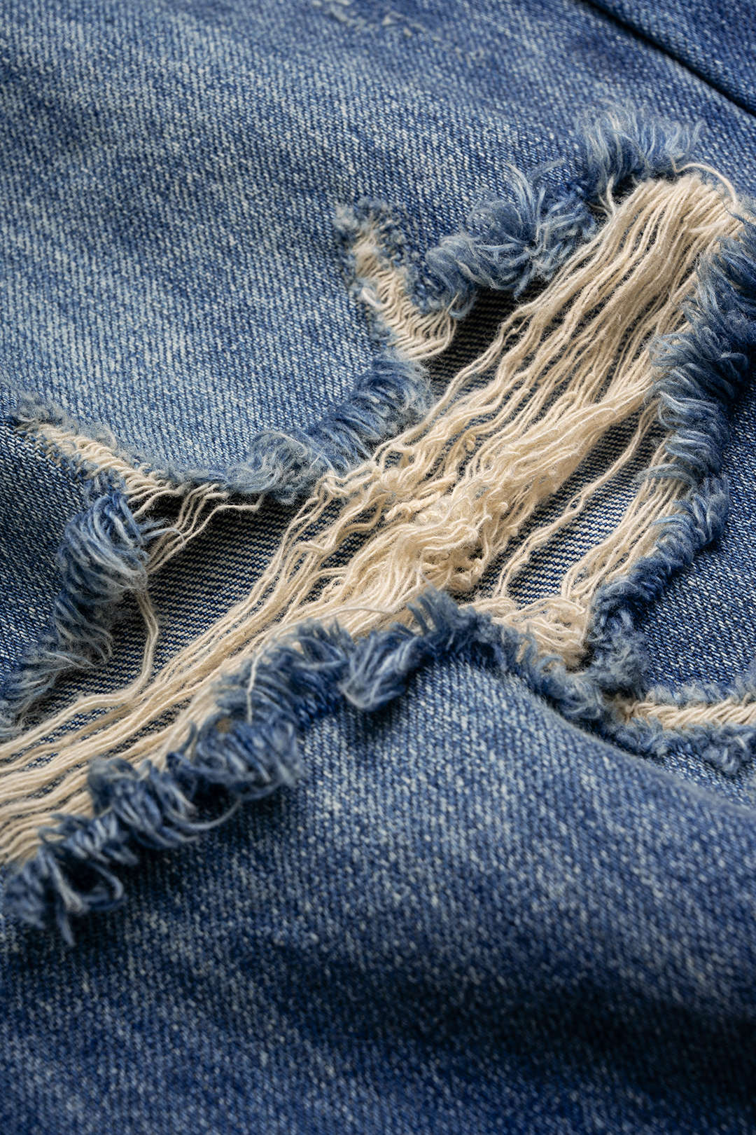 Denim Asymmetrical Frayed Barrel Jeans