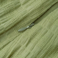 Textured One Shoulder Twist Knot Mini Dress